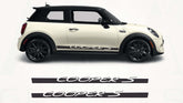 White Mini Cooper S car with black roof and wheels on a white background, featuring 'Cooper S' decals.